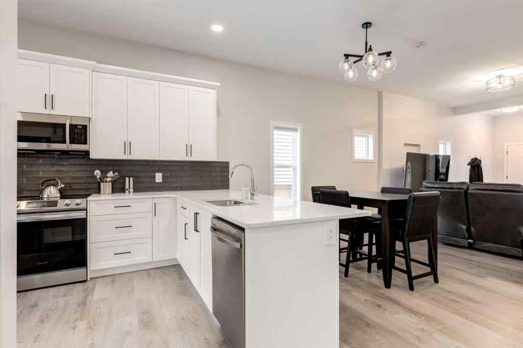 MLS® A2249629 - 812 Reynolds Manor SW in Coopers Crossing Airdrie, Residential