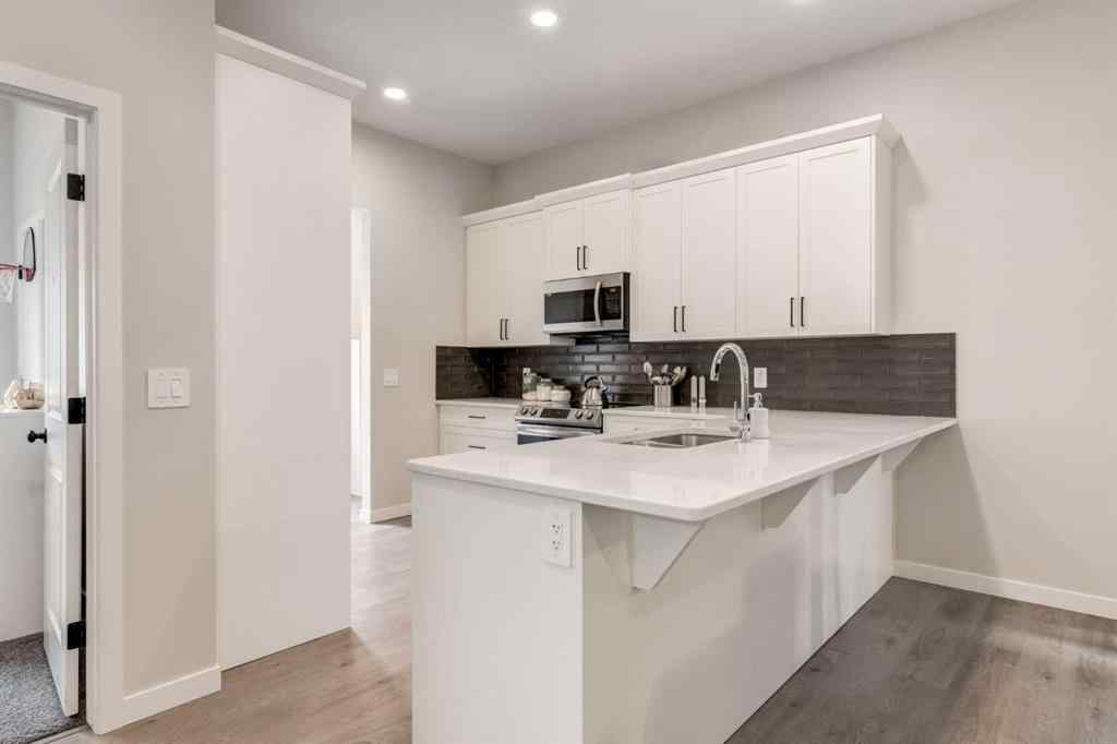 MLS® A2249629 - 812 Reynolds Manor SW in Coopers Crossing Airdrie, Residential