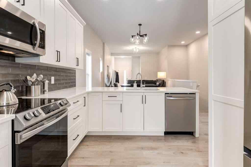 MLS® A2249629 - 812 Reynolds Manor SW in Coopers Crossing Airdrie, Residential