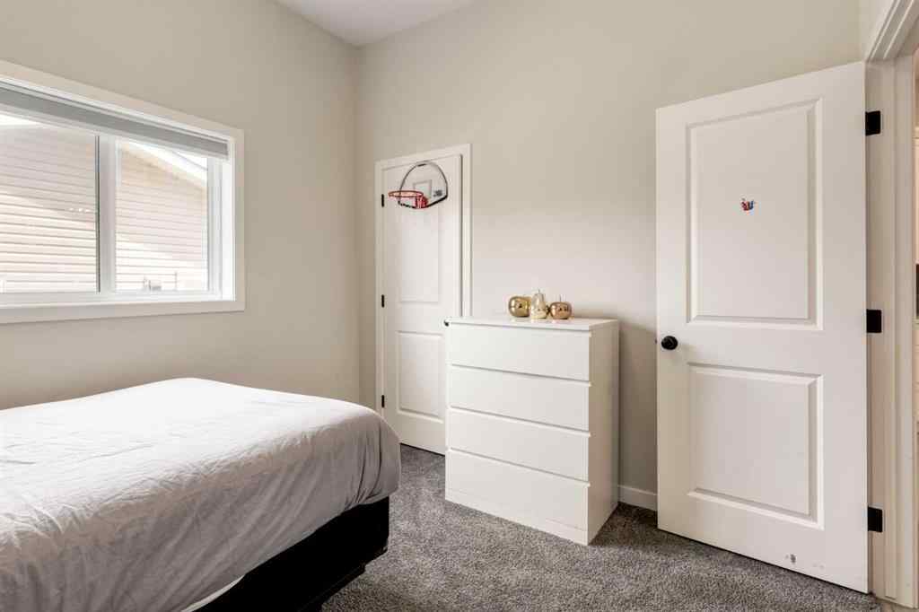 MLS® A2249629 - 812 Reynolds Manor SW in Coopers Crossing Airdrie, Residential
