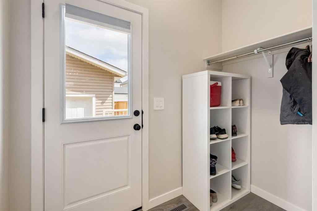 MLS® A2249629 - 812 Reynolds Manor SW in Coopers Crossing Airdrie, Residential