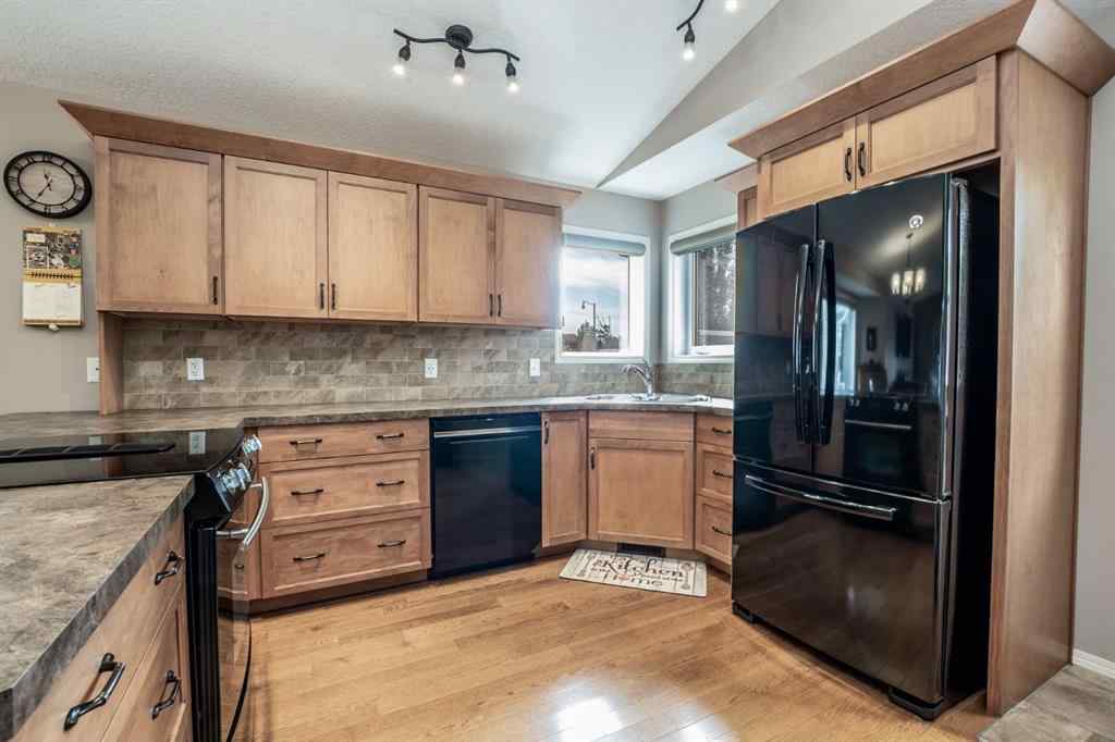 MLS® A2249648 - 625 Hampshire Way NE in Hampton Hills High River, Residential