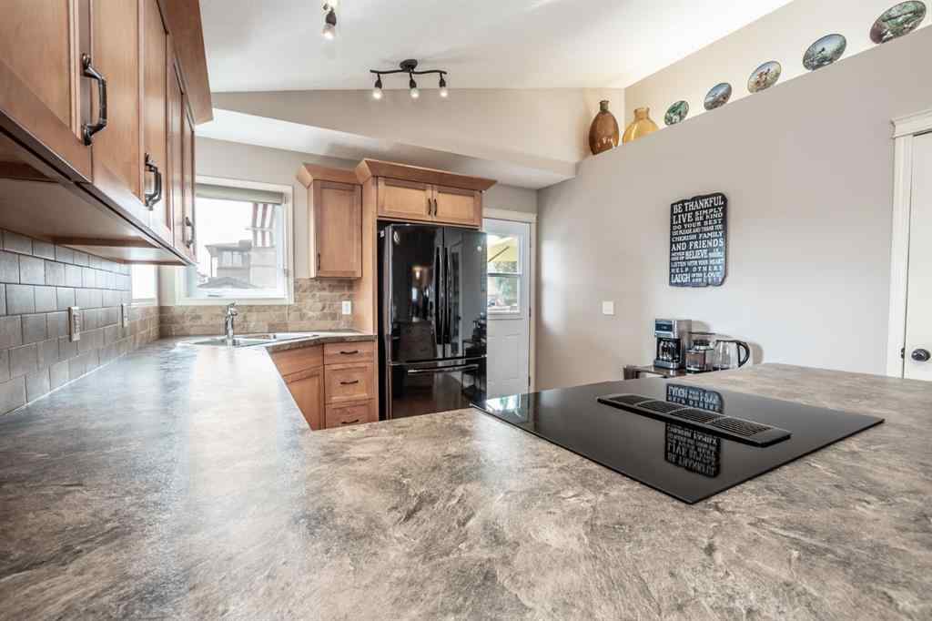 MLS® A2249648 - 625 Hampshire Way NE in Hampton Hills High River, Residential