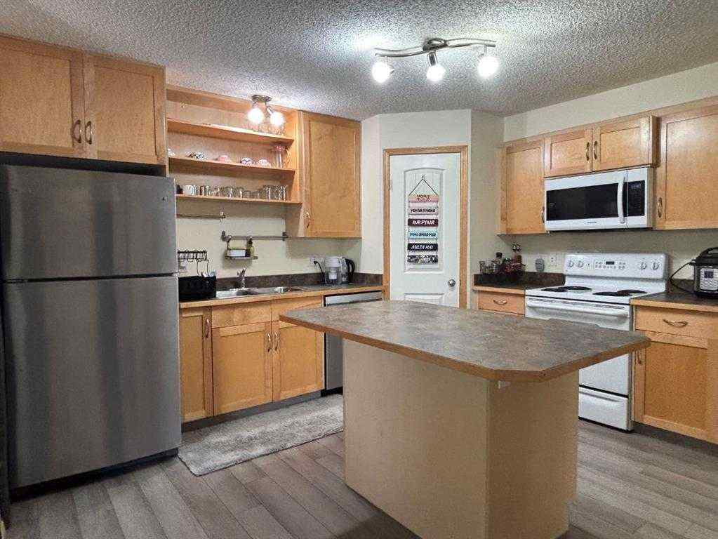 MLS® A2249649 - Unit #106 8 Everridge Square SW in Evergreen Calgary, Residential