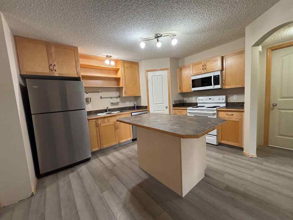 MLS® A2249649 - Unit #106 8 Everridge Square SW in Evergreen Calgary, Residential
