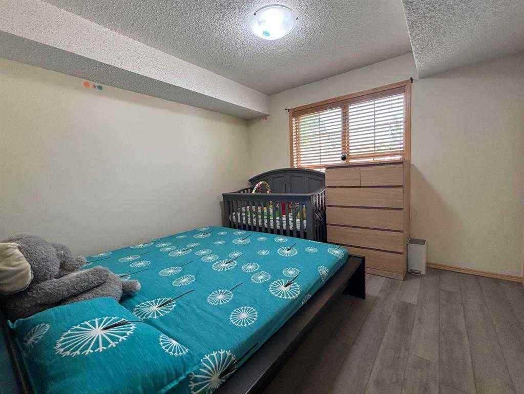 MLS® A2249649 - Unit #106 8 Everridge Square SW in Evergreen Calgary, Residential