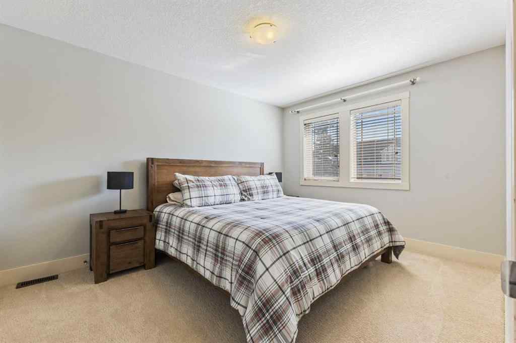 MLS® A2249671 - 5566 Henwood Street SW in Garrison Green Calgary, Residential