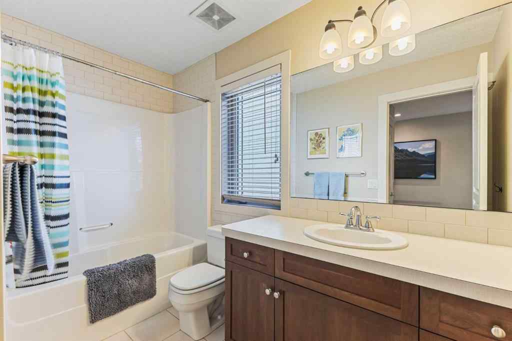 MLS® A2249671 - 5566 Henwood Street SW in Garrison Green Calgary, Residential
