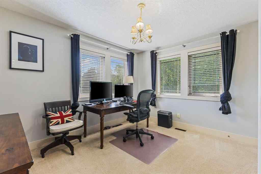 MLS® A2249671 - 5566 Henwood Street SW in Garrison Green Calgary, Residential