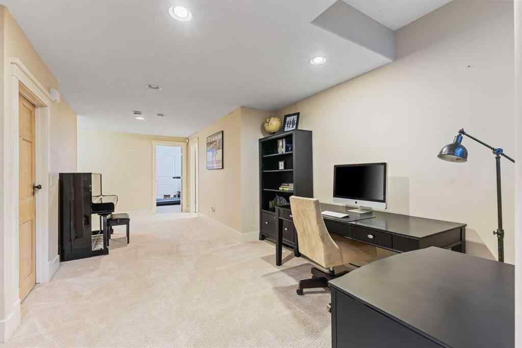 MLS® A2249671 - 5566 Henwood Street SW in Garrison Green Calgary, Residential