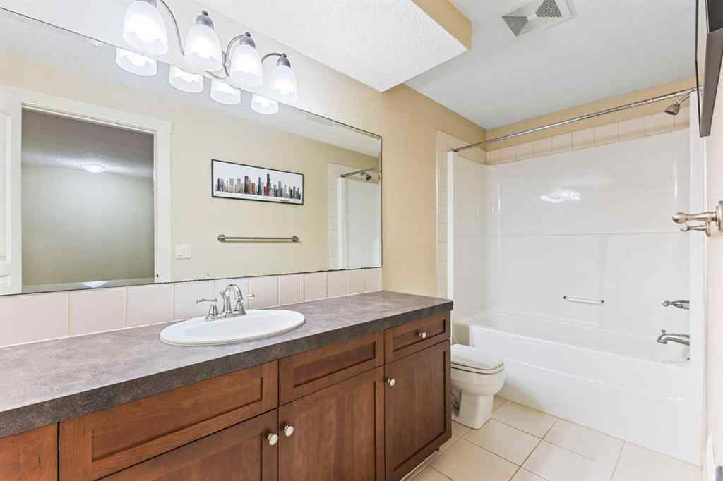 MLS® A2249671 - 5566 Henwood Street SW in Garrison Green Calgary, Residential