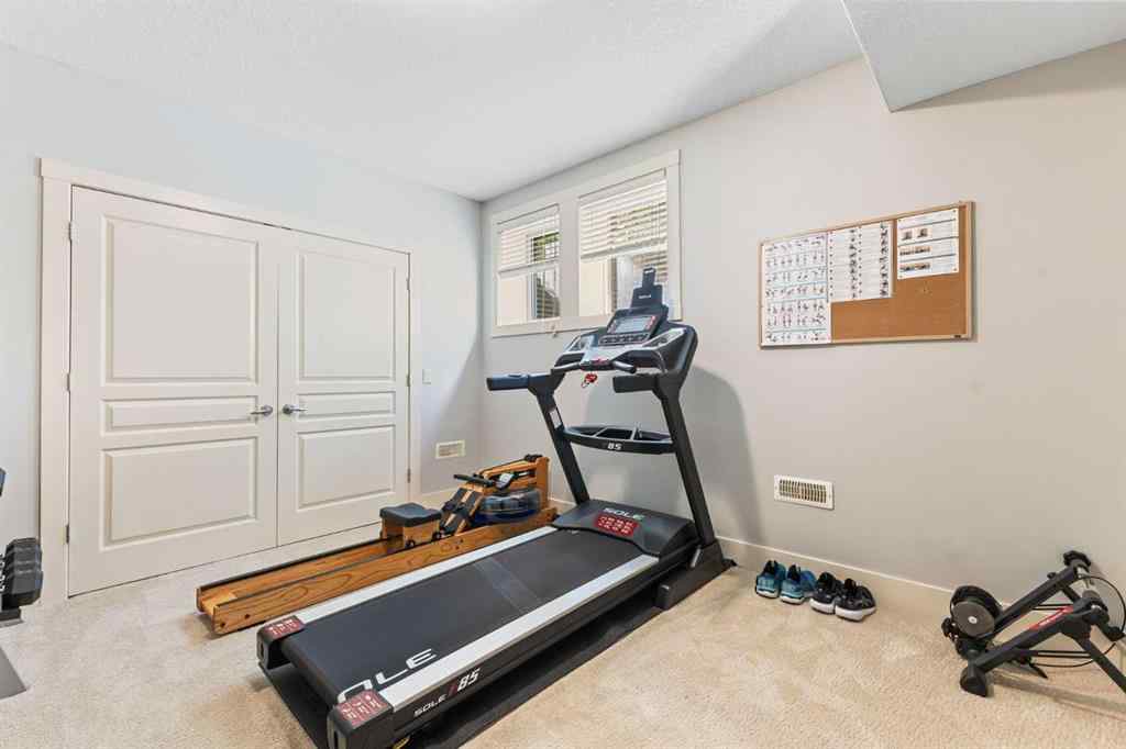 MLS® A2249671 - 5566 Henwood Street SW in Garrison Green Calgary, Residential
