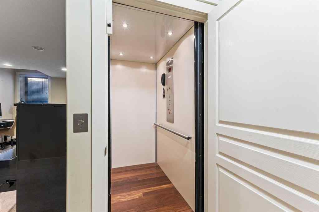 MLS® A2249671 - 5566 Henwood Street SW in Garrison Green Calgary, Residential