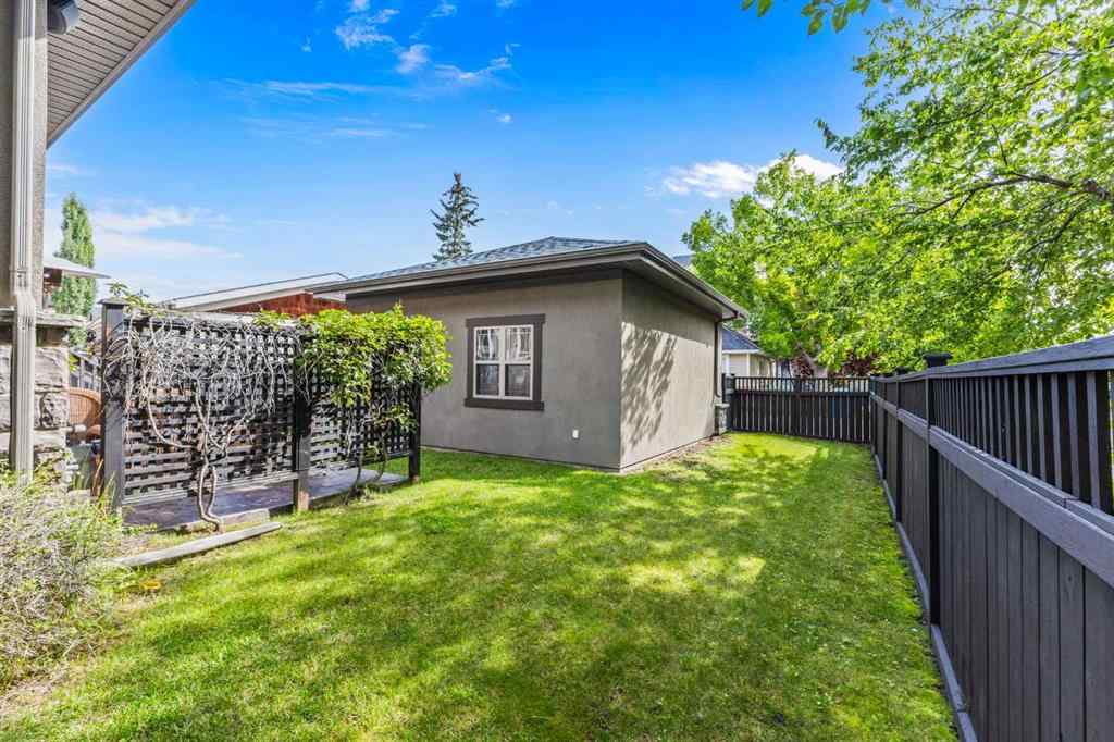 MLS® A2249671 - 5566 Henwood Street SW in Garrison Green Calgary, Residential