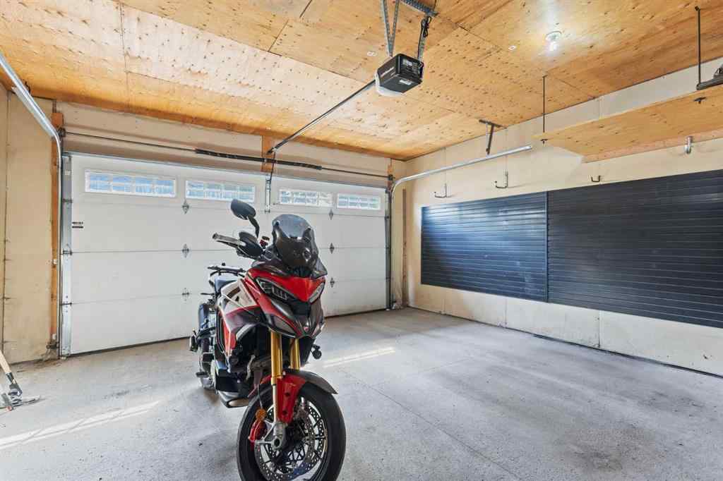 MLS® A2249671 - 5566 Henwood Street SW in Garrison Green Calgary, Residential