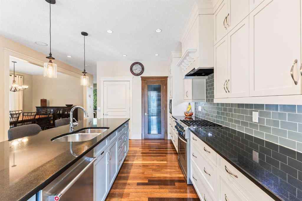 MLS® A2249671 - 5566 Henwood Street SW in Garrison Green Calgary, Residential