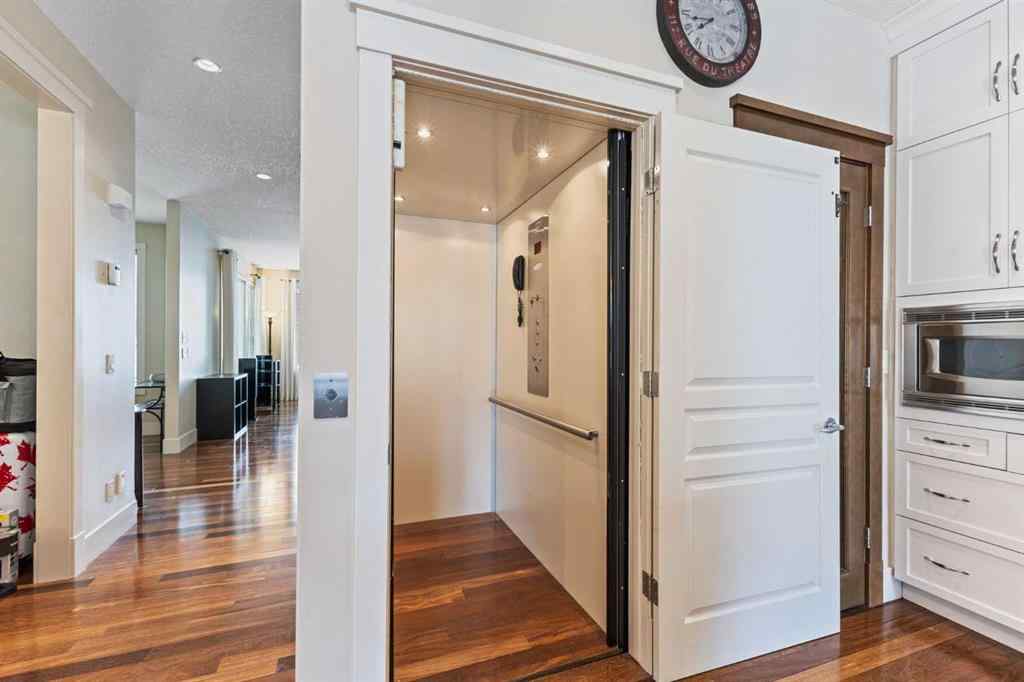 MLS® A2249671 - 5566 Henwood Street SW in Garrison Green Calgary, Residential