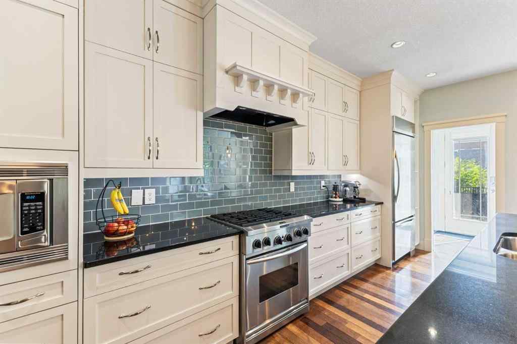 MLS® A2249671 - 5566 Henwood Street SW in Garrison Green Calgary, Residential