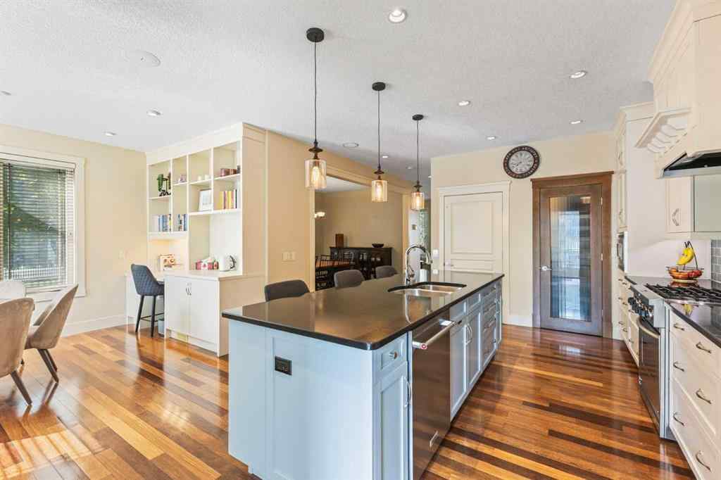 MLS® A2249671 - 5566 Henwood Street SW in Garrison Green Calgary, Residential