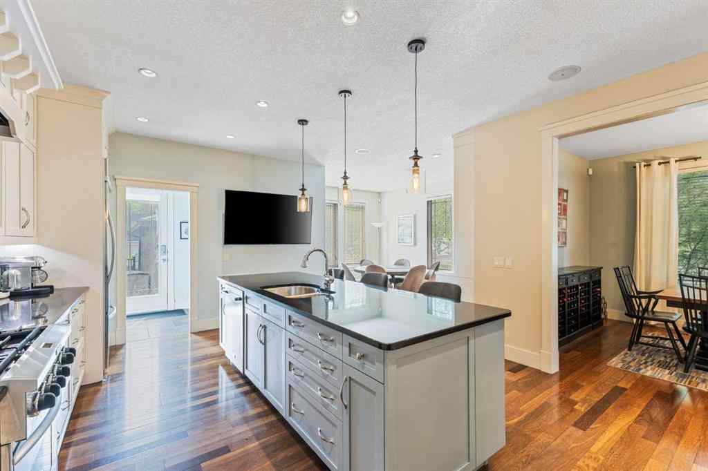MLS® A2249671 - 5566 Henwood Street SW in Garrison Green Calgary, Residential