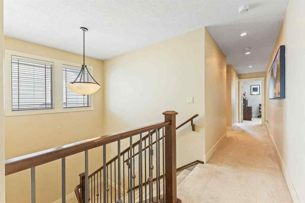 MLS® A2249671 - 5566 Henwood Street SW in Garrison Green Calgary, Residential
