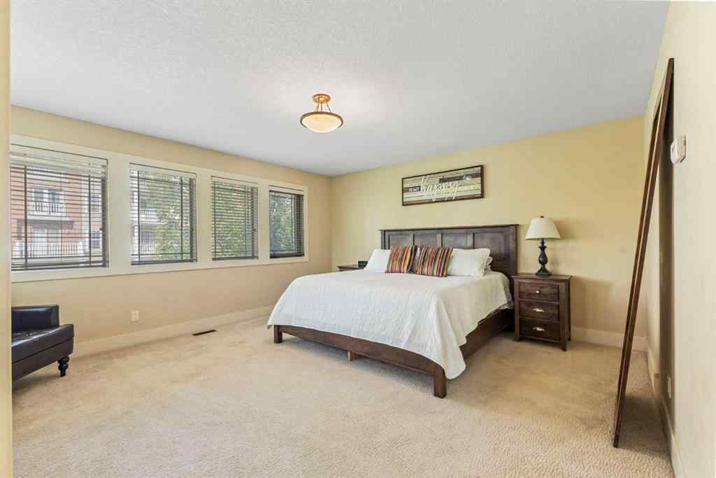 MLS® A2249671 - 5566 Henwood Street SW in Garrison Green Calgary, Residential