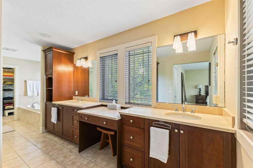 MLS® A2249671 - 5566 Henwood Street SW in Garrison Green Calgary, Residential