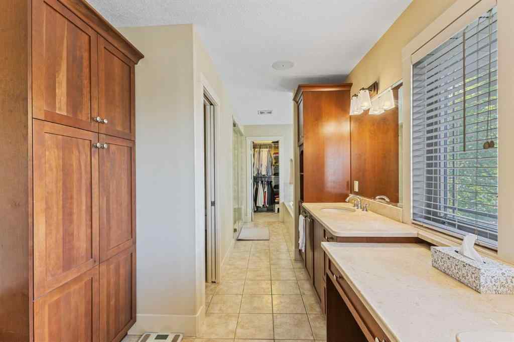 MLS® A2249671 - 5566 Henwood Street SW in Garrison Green Calgary, Residential