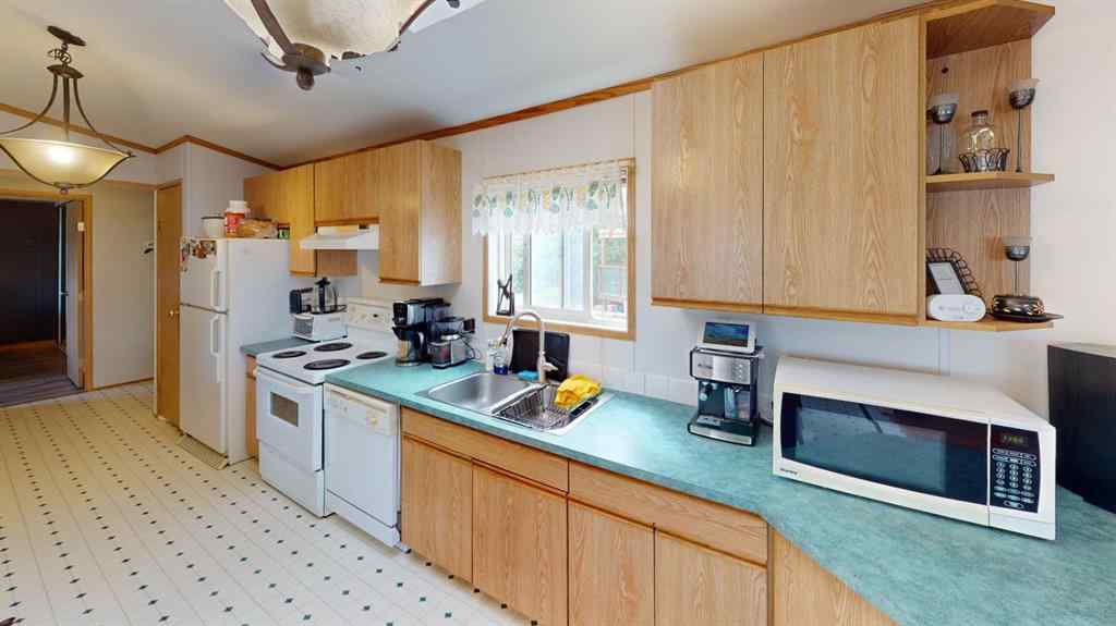 MLS® A2249718 - 105 Meadowlake Close E in Meadow Lake Brooks, Residential