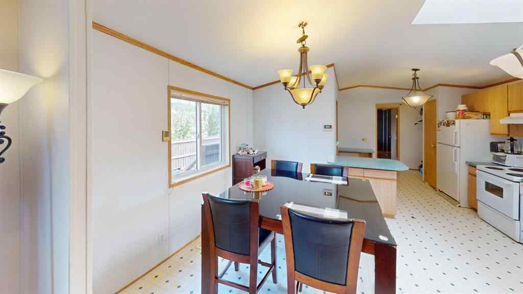 MLS® A2249718 - 105 Meadowlake Close E in Meadow Lake Brooks, Residential