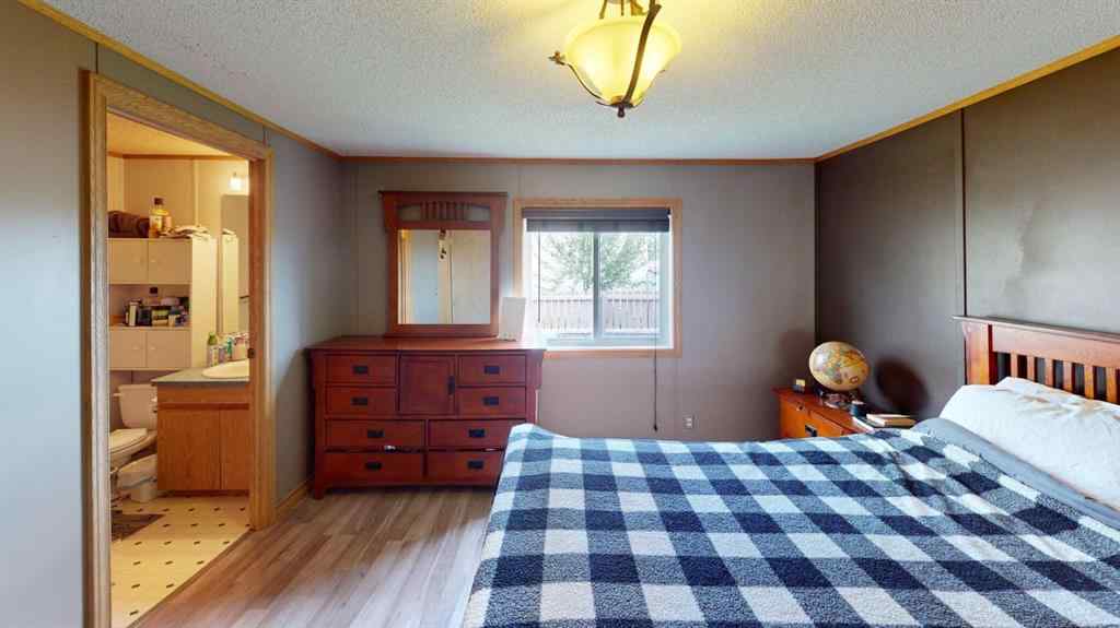 MLS® A2249718 - 105 Meadowlake Close E in Meadow Lake Brooks, Residential