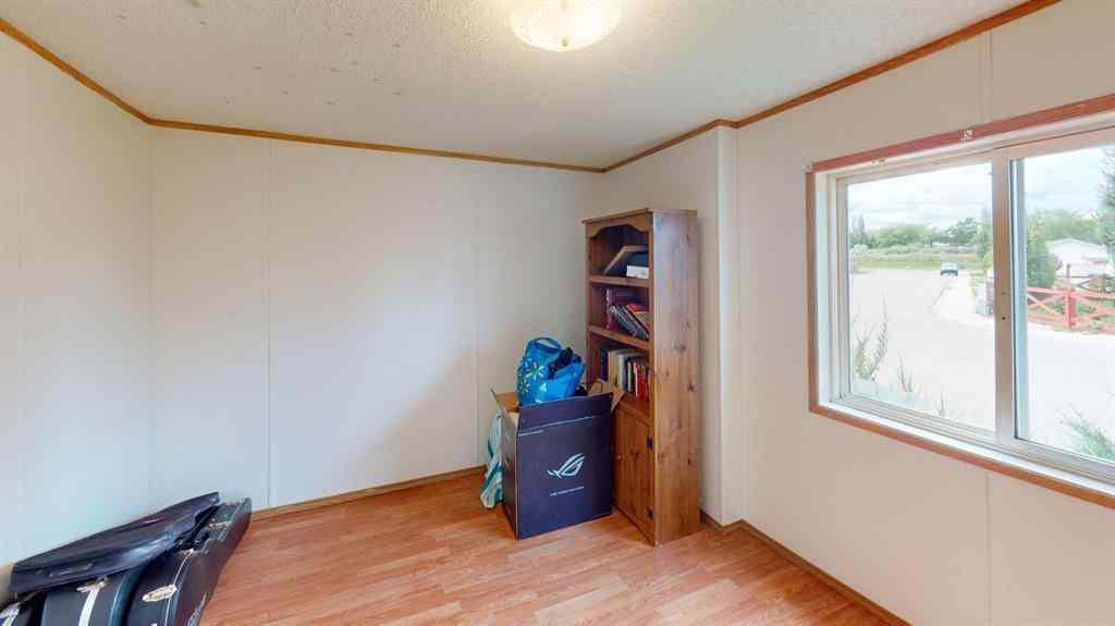 MLS® A2249718 - 105 Meadowlake Close E in Meadow Lake Brooks, Residential