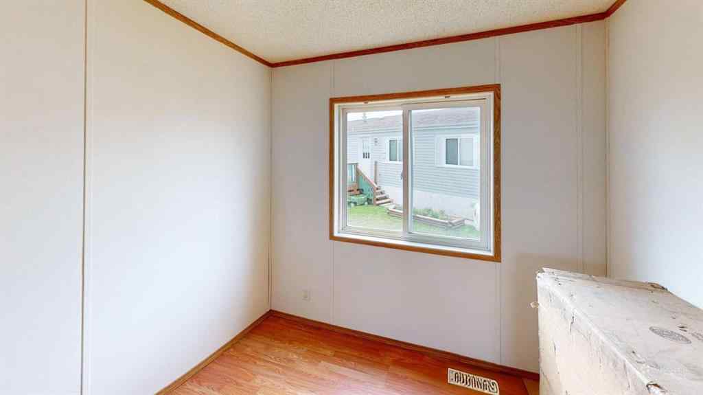 MLS® A2249718 - 105 Meadowlake Close E in Meadow Lake Brooks, Residential