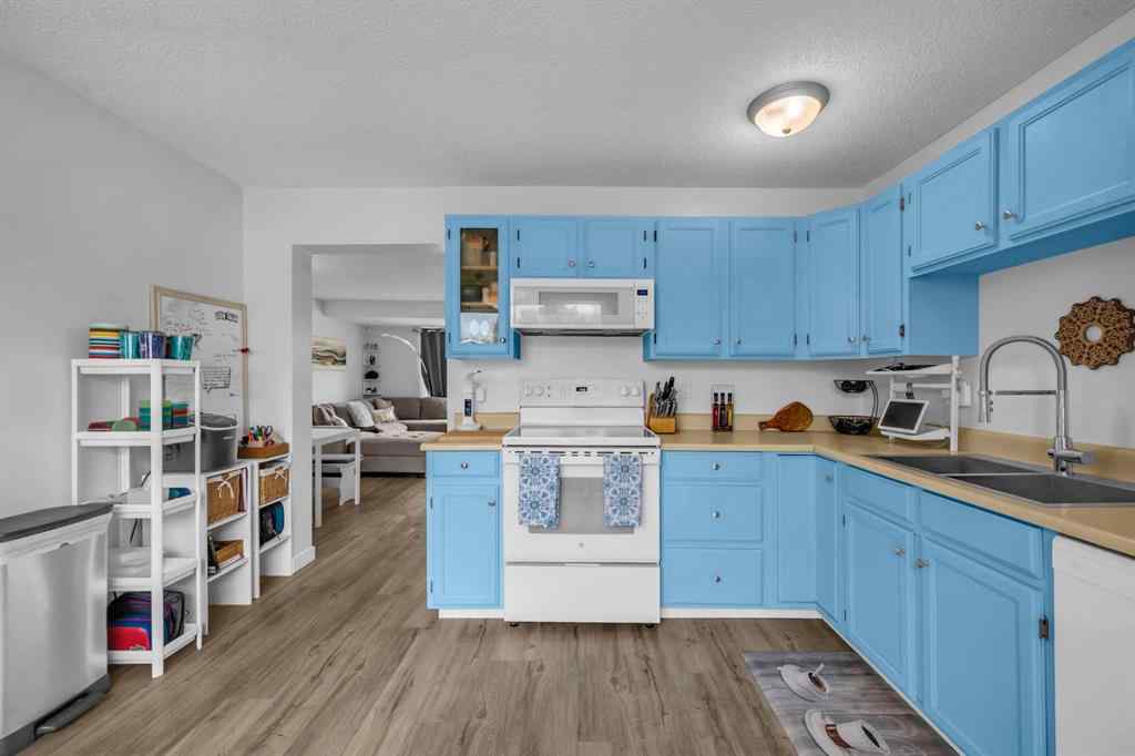 MLS® A2249756 - 30 Sunhurst Crescent SE in Sundance Calgary, Residential
