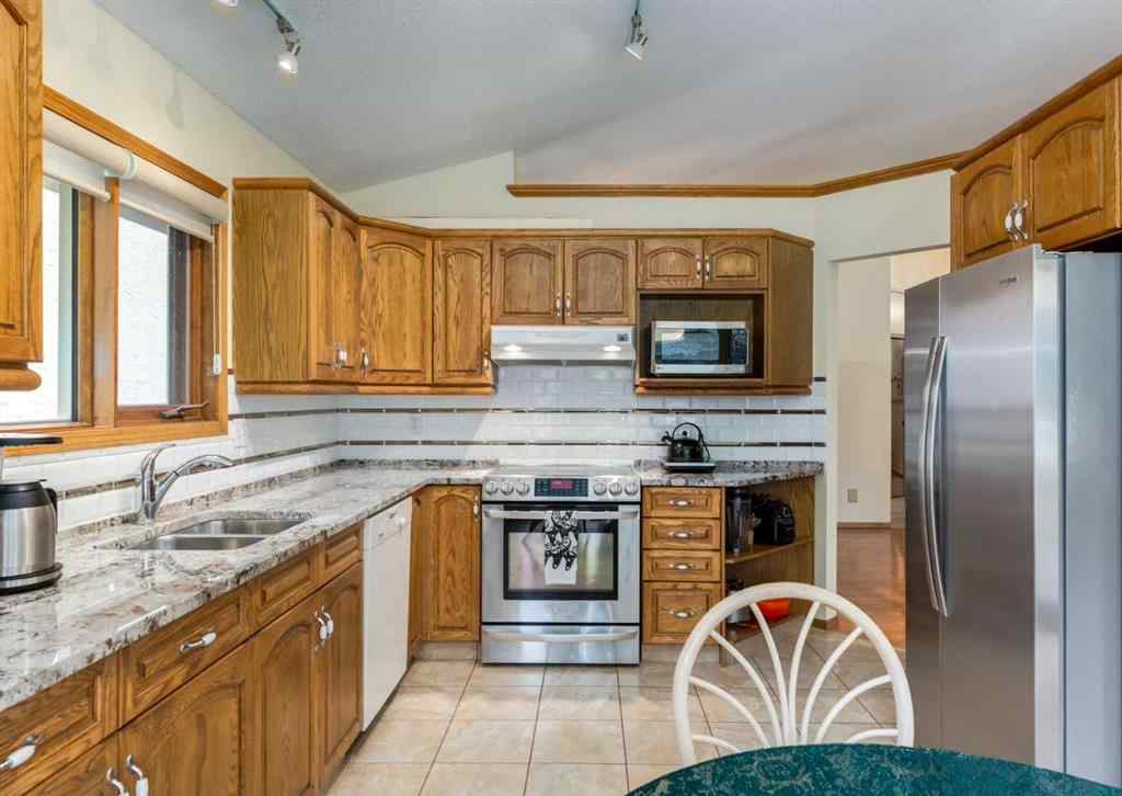 MLS® A2249772 - 206 Hawkside Mews NW in Hawkwood Calgary, Residential