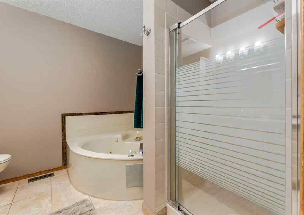 MLS® A2249772 - 206 Hawkside Mews NW in Hawkwood Calgary, Residential