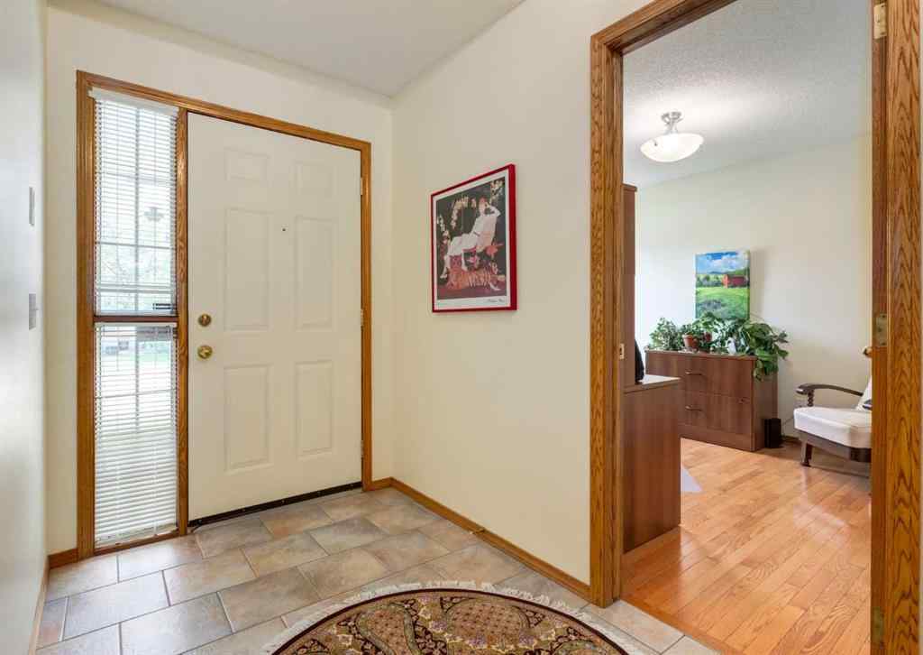 MLS® A2249772 - 206 Hawkside Mews NW in Hawkwood Calgary, Residential
