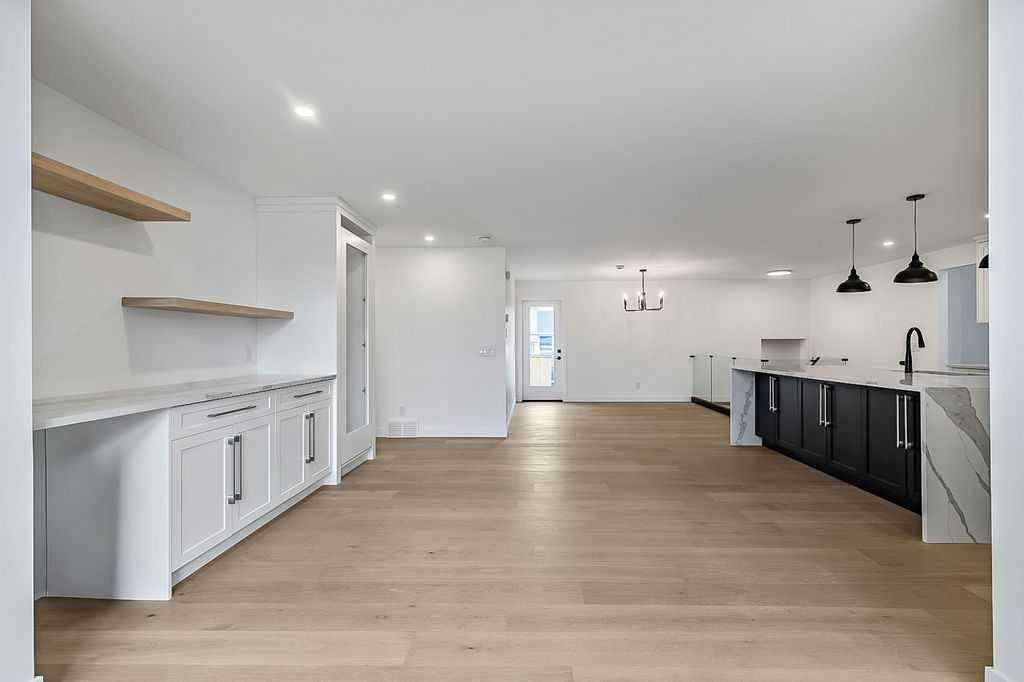 MLS® A2249805 - 13016 Lake Twintree Road SE in Lake Bonavista Calgary, Residential