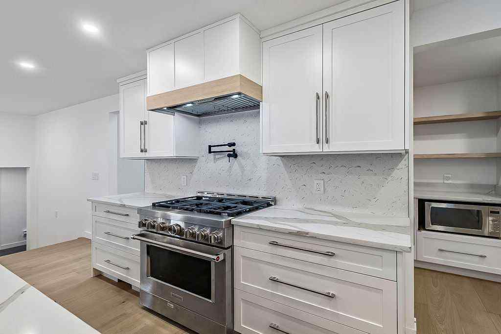 MLS® A2249805 - 13016 Lake Twintree Road SE in Lake Bonavista Calgary, Residential