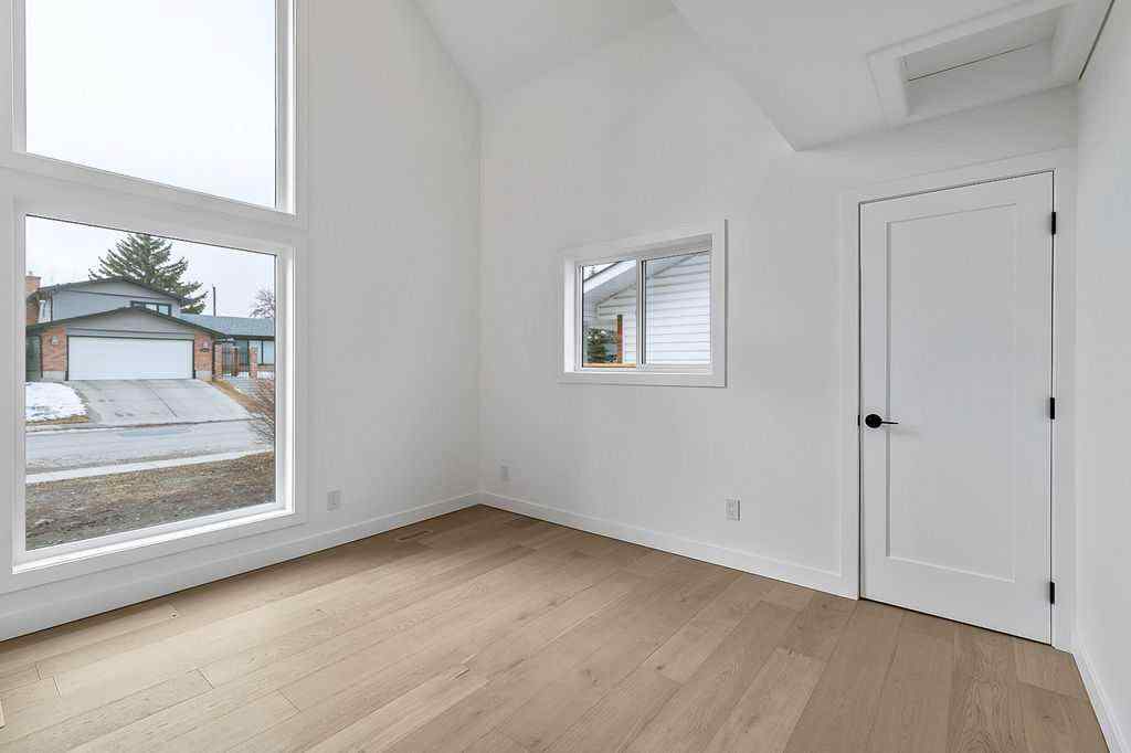 MLS® A2249805 - 13016 Lake Twintree Road SE in Lake Bonavista Calgary, Residential