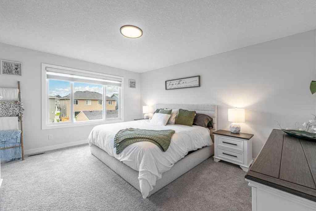 MLS® A2249859 - 178 Creekstone Path SW in Pine Creek Calgary, Residential