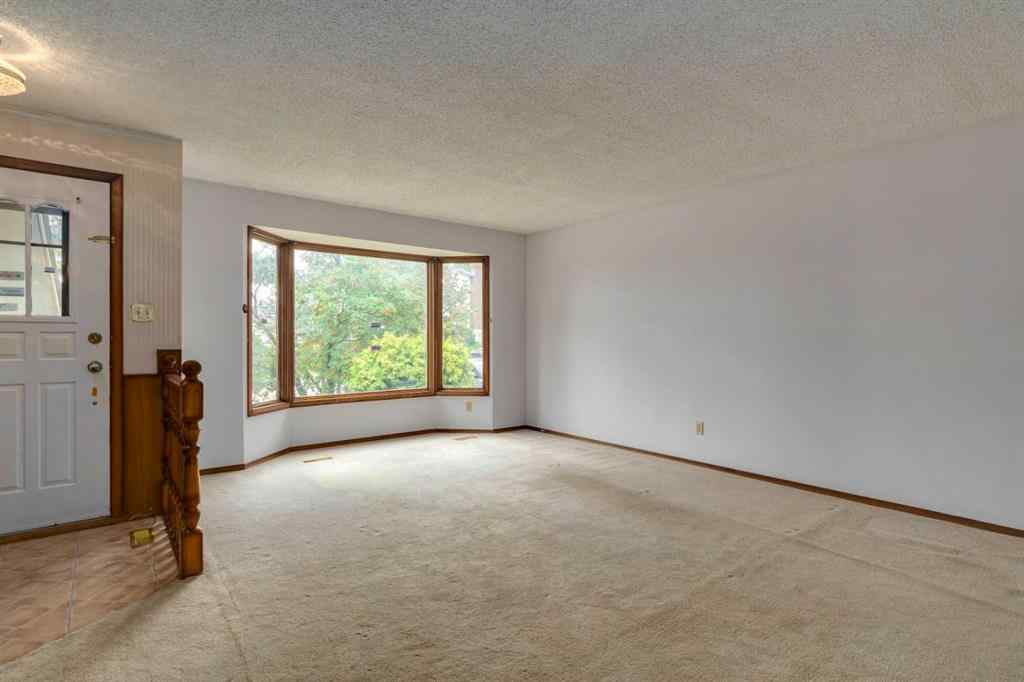 MLS® A2249864 - 24 Strathcona Close SW in Strathcona Park Calgary, Residential