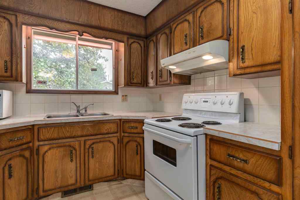 MLS® A2249864 - 24 Strathcona Close SW in Strathcona Park Calgary, Residential