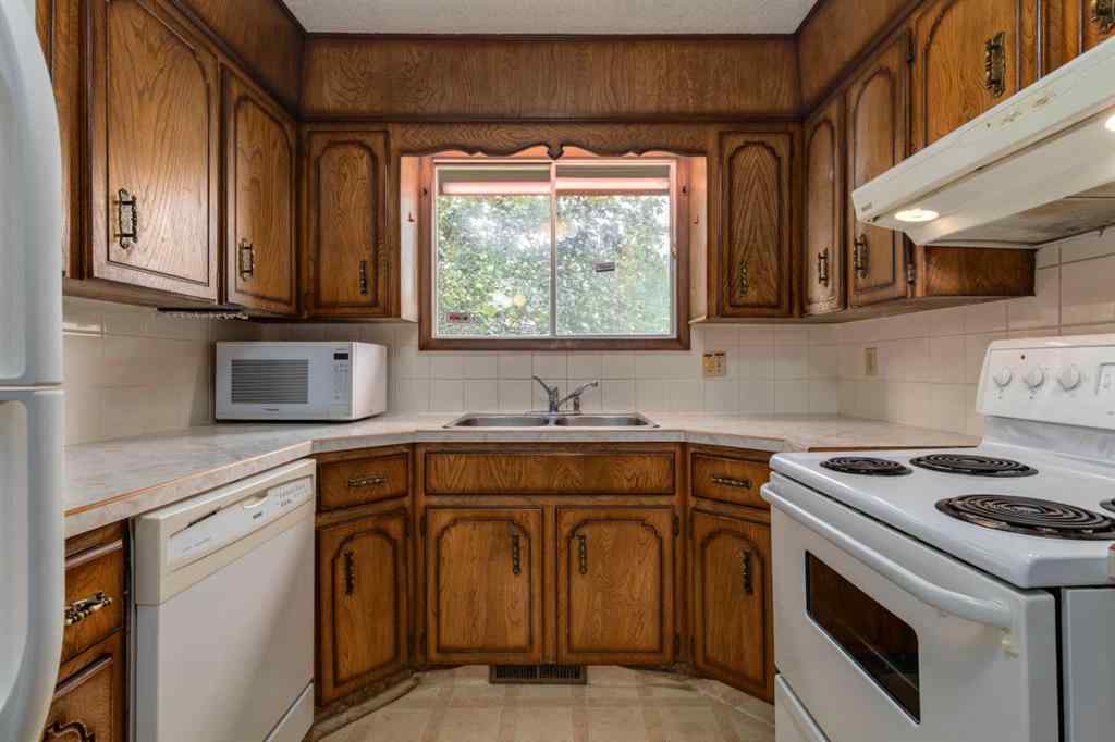 MLS® A2249864 - 24 Strathcona Close SW in Strathcona Park Calgary, Residential