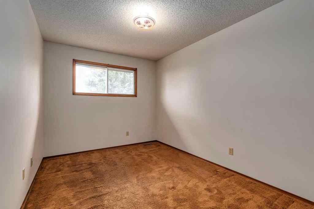 MLS® A2249864 - 24 Strathcona Close SW in Strathcona Park Calgary, Residential