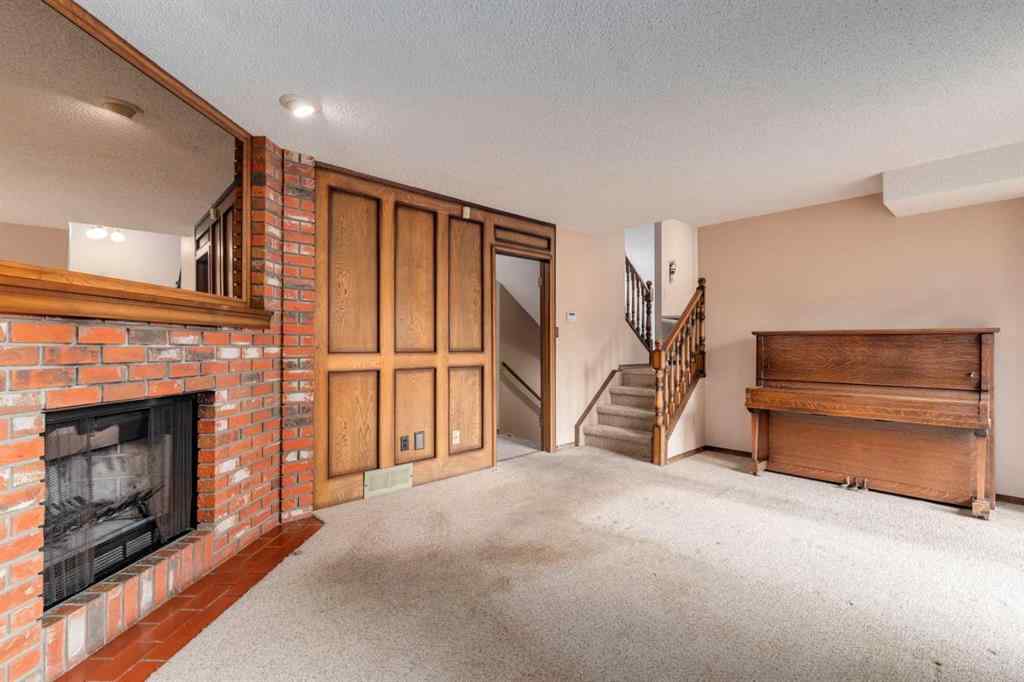MLS® A2249864 - 24 Strathcona Close SW in Strathcona Park Calgary, Residential