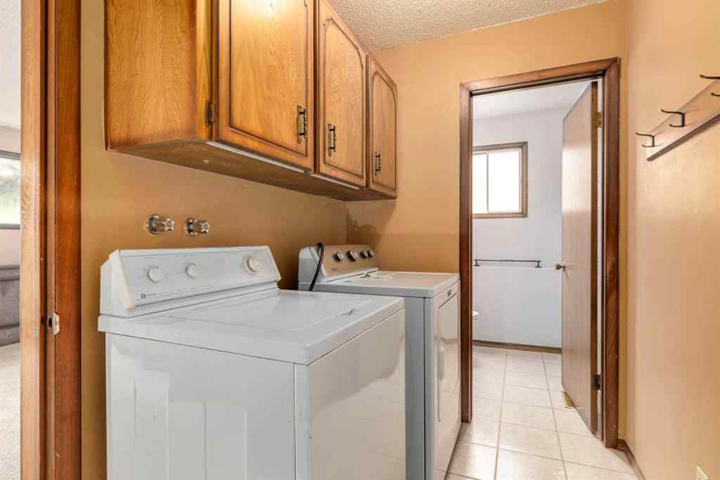 MLS® A2249864 - 24 Strathcona Close SW in Strathcona Park Calgary, Residential