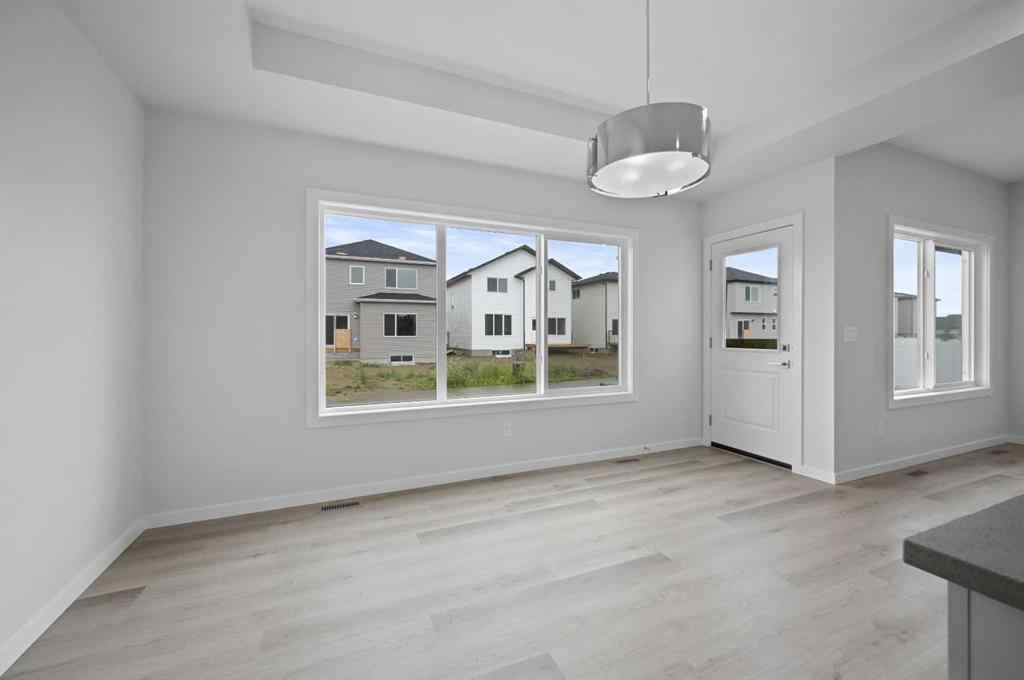 MLS® A2249894 - 104 Emerald Drive  in Evergreen Red Deer, Residential