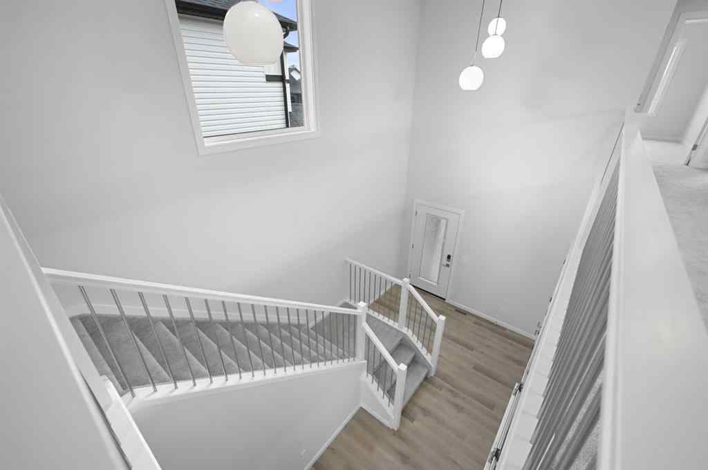 MLS® A2249894 - 104 Emerald Drive  in Evergreen Red Deer, Residential