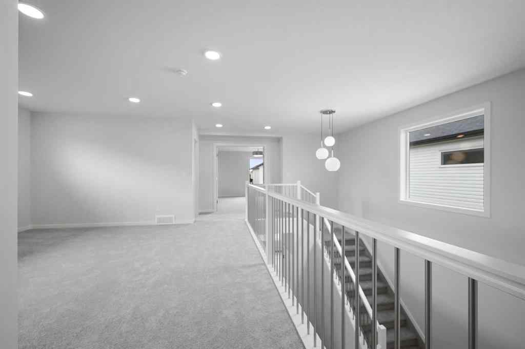 MLS® A2249894 - 104 Emerald Drive  in Evergreen Red Deer, Residential